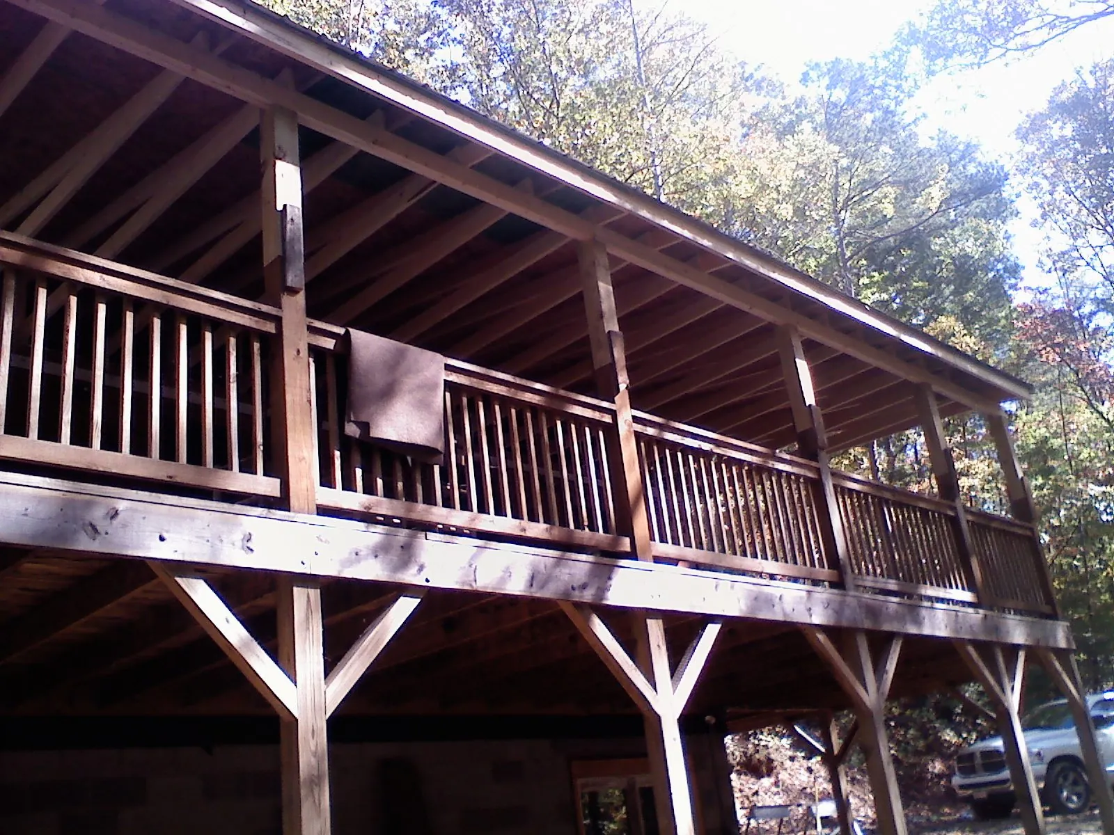 Timber framing under a new elevated porch and deck — Roof Leak Repair in Speed by Roofing Brothers